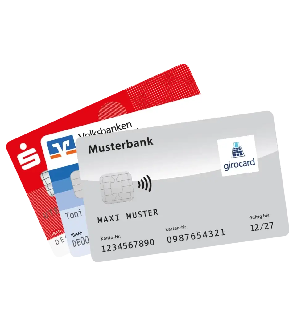 Abbildung zeigt verschiedene Bankkarten, darunter eine girocard der Musterbank, eine Volksbankkarte und eine weitere Karte mit persönlichen Angaben, die für bargeldloses Bezahlen verwendet werden.